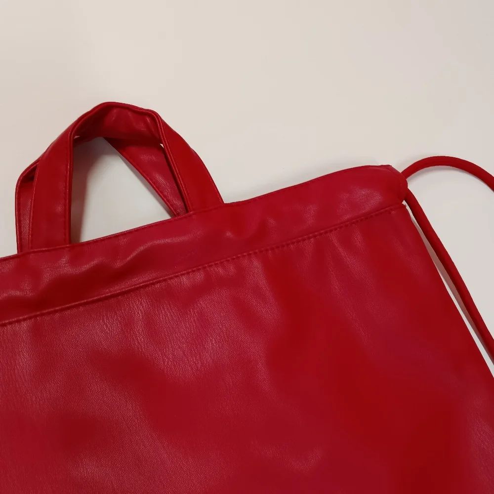 JORDAN Red Faux Leather Drawstring Backpack with Gold Jumpman